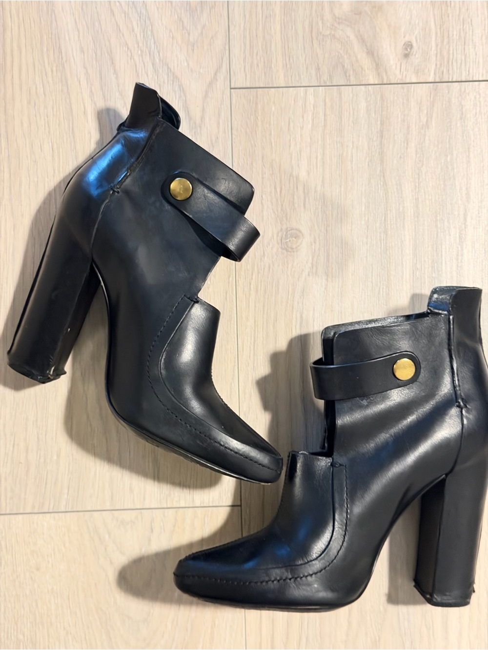 Alexander Wang Black Leather Strap Ankle Booties with Gold Accent